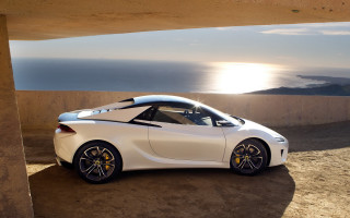 White sports car ocean view - the sun free wallpaper