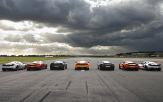 Sports cars runway cloudy sky - perfect symmetry free wallpaper