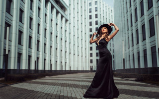 Woman black dress hat city - art deco free wallpaper