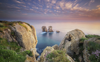 Rocky cliff water clouds landscape - a rocky cliff free wallpaper