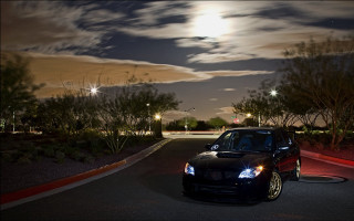 Night moon car park city - the moon in the background free wallpaper