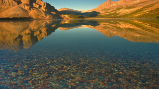 Mountain reflection lake rocks city - rock free wallpaper