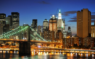 City skyline bridge river night 92 - a bridge in the foreground free wallpaper