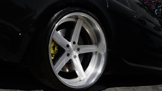 Car tire street flower black - a flower in the background free wallpaper