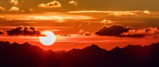 Sunset sun clouds mountains beach - a few mountain free wallpaper