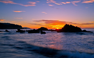 Sunset ocean rocks waves bridge - a sunset over the ocean free wallpaper