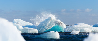 Large iceberg ocean iceberg sky - ice free wallpaper