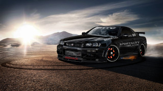 Black car orange wheels desert - fine art free wallpaper