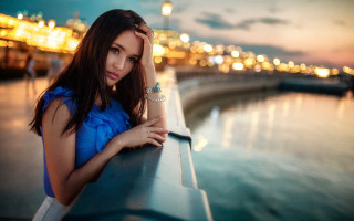 Woman waterfront night city lights - the background and a city skyline free wallpaper