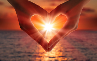Heart hands sunset ocean flame - their hands in free wallpaper
