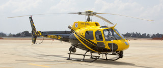 Yellow helicopter airport tarmac clouds - top of an airport tarmac free wallpaper