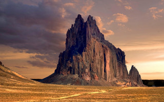 Mountain dirtroad cloudy sky sunset - a large mountain free wallpaper