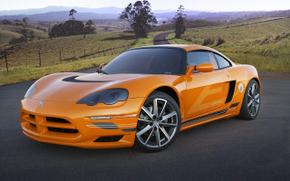 Bright orange sports car road - concept design free wallpaper