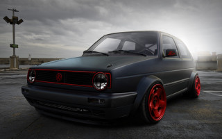 Gray van red rims cloudy - a parking lot free wallpaper