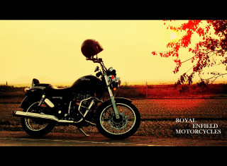 Motorcycle parked road tree field 2 - a sunset in the background free wallpaper