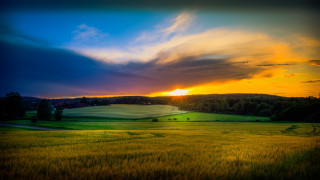 Sunset field clouds road grass - a sunset in the background free wallpaper