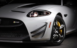 White car yellow wheels dark - a black background free wallpaper