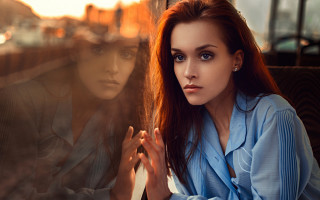 Woman looking out window man - a man in the background free wallpaper