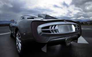 Futuristic car cloudy sky building - a futuristic car free wallpaper
