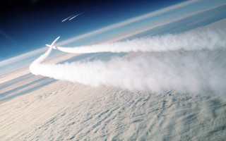 Plane smoke sky beach ocean - an airbrush painting free wallpaper