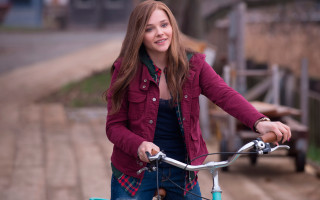 Woman bike street fence cow 2 - a cow free wallpaper