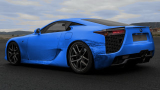Blue sports car mountains clouds - a road free wallpaper