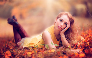 Woman yellow dress autumn firelight - her head free wallpaper
