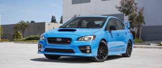 Blue subaru parking lot building - private press free wallpaper