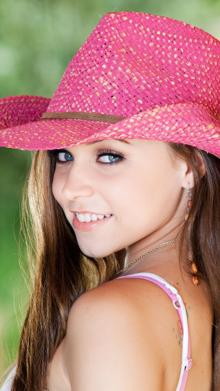 Girl pink hat smiling green - portrait photography free wallpaper