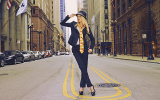 Woman suit tie city street - car and buildings free wallpaper