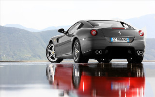 Black sports car reflective mountains - reflective free wallpaper