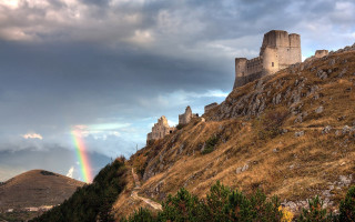 Rainbow castle hillscape medieval matte - a hill side free wallpaper