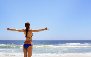 Woman beach bikini outstretched arms - her arm free wallpaper