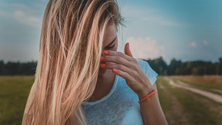 Blonde woman hands face sky - florianne becker free wallpaper