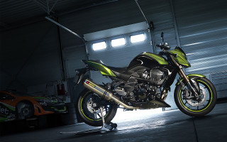 Garage motorcycle car trailer futurism - a car in the background free wallpaper