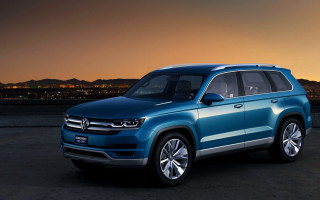 Blue volkswagen suv sunset city - private press free wallpaper