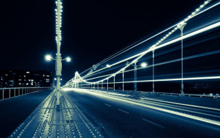 Long exposure night street lights - a bridge in the background free wallpaper