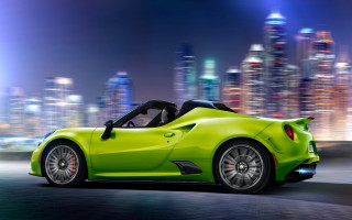 Green sports car night city - a green sports car free wallpaper