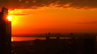 Sunset city river skyline embers - a sunset over a city free wallpaper