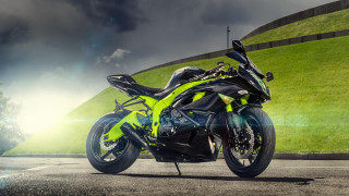 Motorcycle hill grass cloudy sky - a cloudy sky in the background free wallpaper
