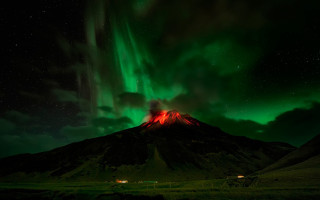 Aurora mountain city sky fireworks - a green sky free wallpaper