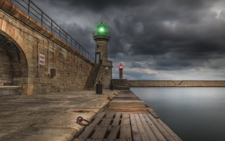 Lighthouse green light water bridge - a bridge in the background free wallpaper
