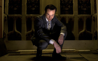 Man suit tie crouching window 2 - andrew stevovich free wallpaper