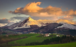 Mountain range snowy background green - mountain in the background free wallpaper