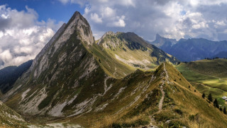 Mountain range clouds trees panorama - a matte painting free wallpaper