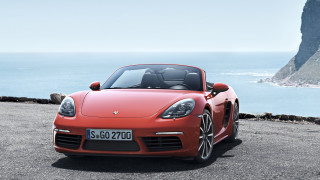 Red sports car ocean cliff 2 - a red sports car free wallpaper