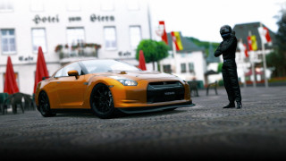 Black outfit person car parking - foto realistic free wallpaper