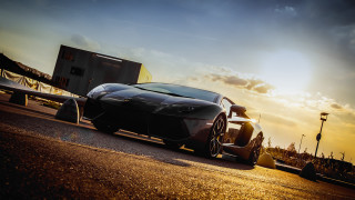 Black sports car sunset matte - a box free wallpaper