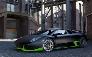 Black green sports car building - sports car free wallpaper