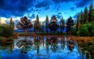 Lake trees clouds blue sky - a few cloud free wallpaper